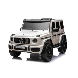 Električni automobil Mercedes-Benz G63 AMG 4x4² Dvosjed 12V, bijeli, MP3 Player sa USB/AUX ulazom, 4x4 pogon, Baterija 12V14Ah, EVA felge sa ovjesom, Kožna sjedala, Daljinski upravljač, Licenca